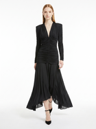 Woman wearing a black dress on a white background