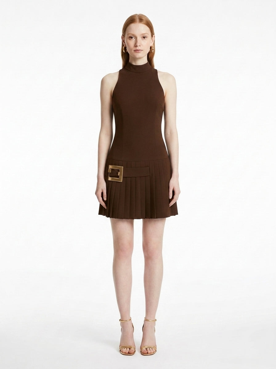 Woman wearing the Gold-Buckle Mini Dress in Chocolate Brown featuring gold square buckle, front view on a white studio background