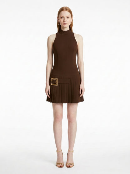 Woman wearing the Gold-Buckle Mini Dress in Chocolate Brown featuring gold square buckle, front view on a white studio background
